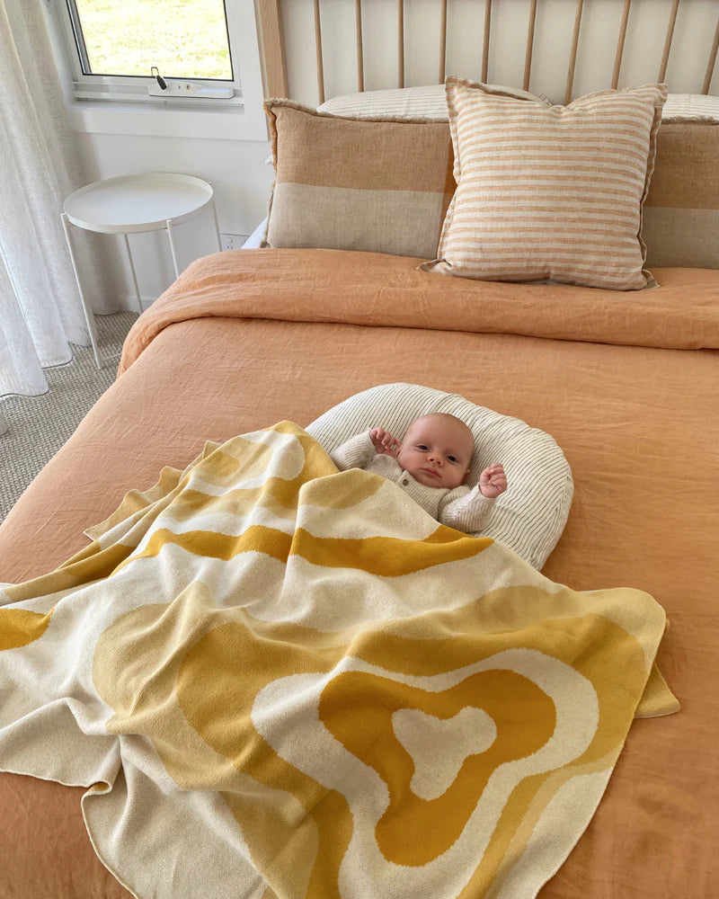 The Bundle Co Mustard Swirl Blanket
